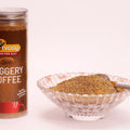 Sarvaay Jaggery Coffee Powder jar with a bowl of jaggery coffee powder and spoon inside, ideal for natural sweet coffee preparation